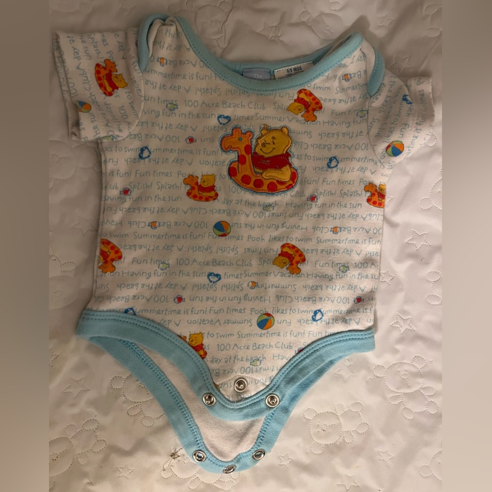 Disney onesie 0-3 months.